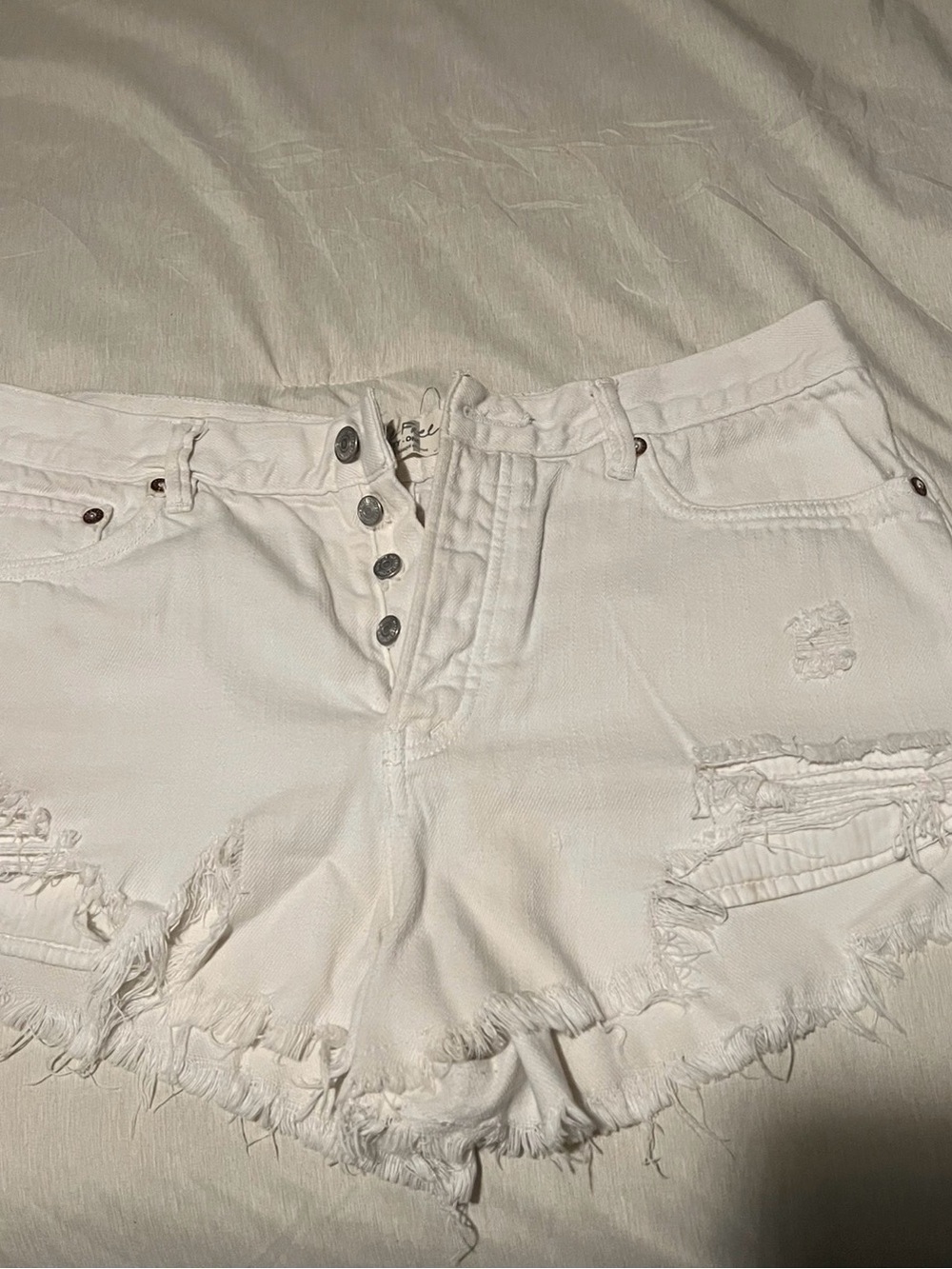 Free People white denim shorts 31